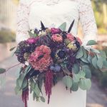 A Maine Wedding Venue on the Water and All Inclusive Packages wedding venues bride with autumn bouquet